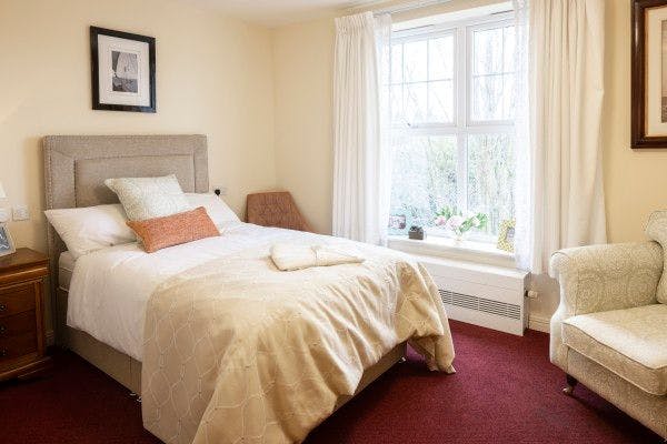 Bedroom of Llys Cynoed care home in Cardiff, Wales