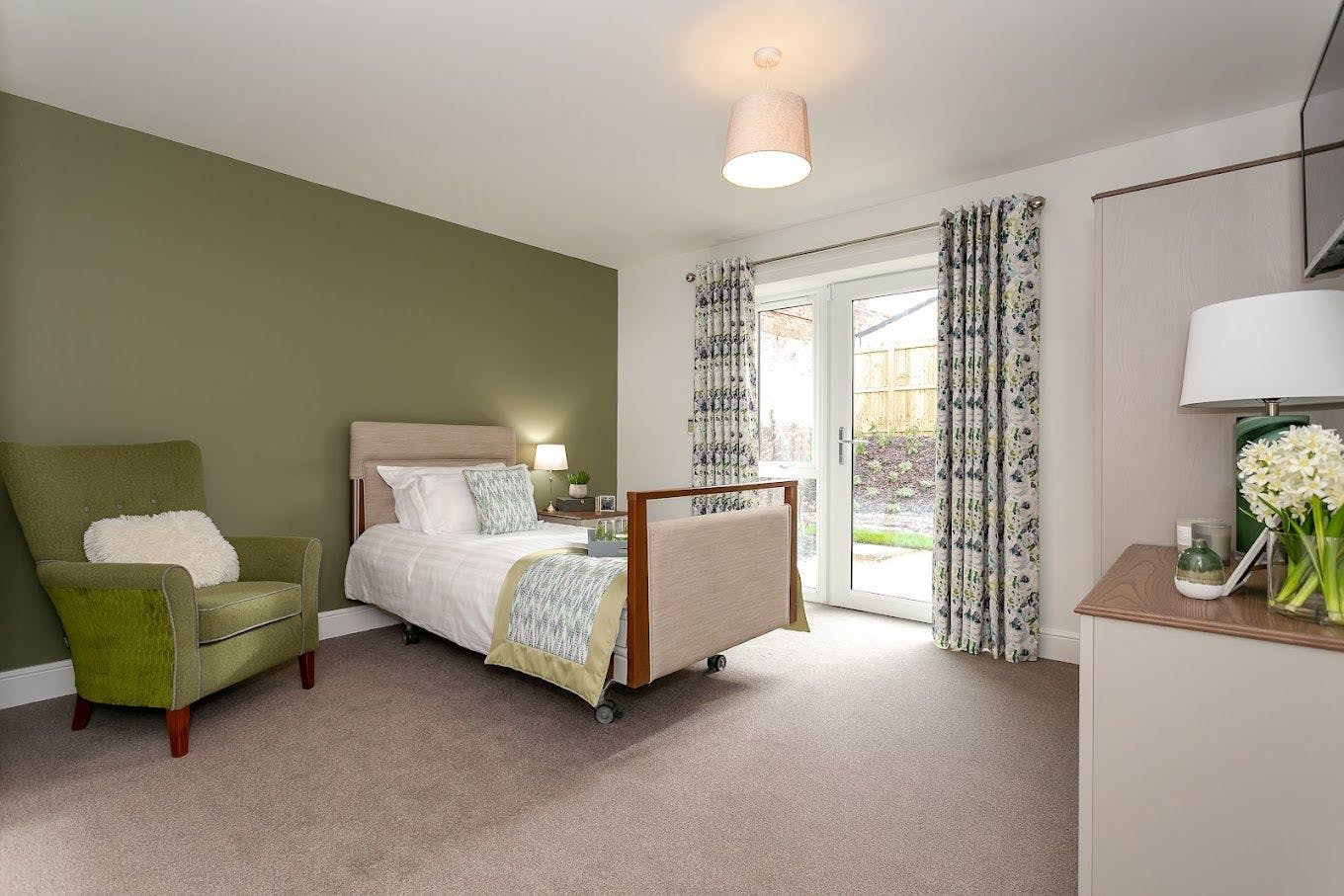 Bedroom of Harcourt Gardens care home in Harrogate, Yorkshire