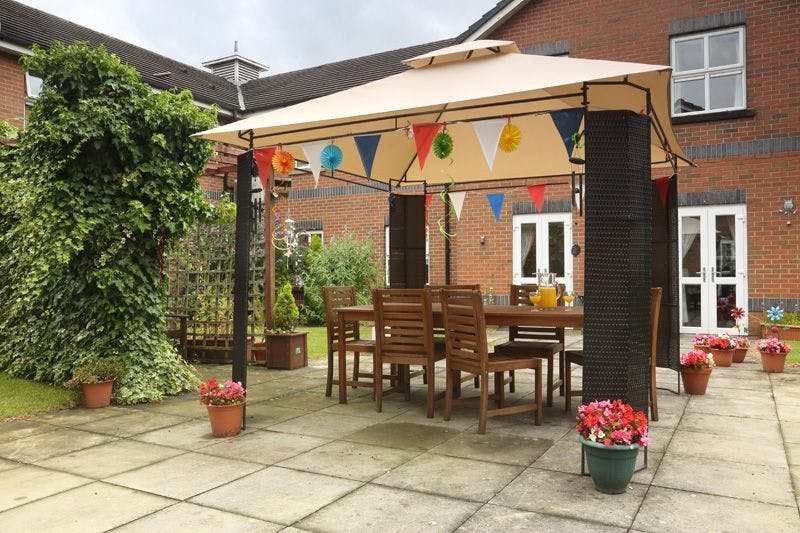 Garden of Hollins Park Care Home in Macclesfield, Cheshire East