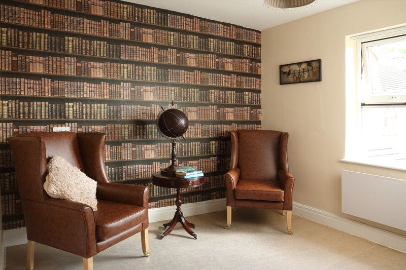 Lounge of Hollins Park Care Home in Macclesfield, Cheshire East