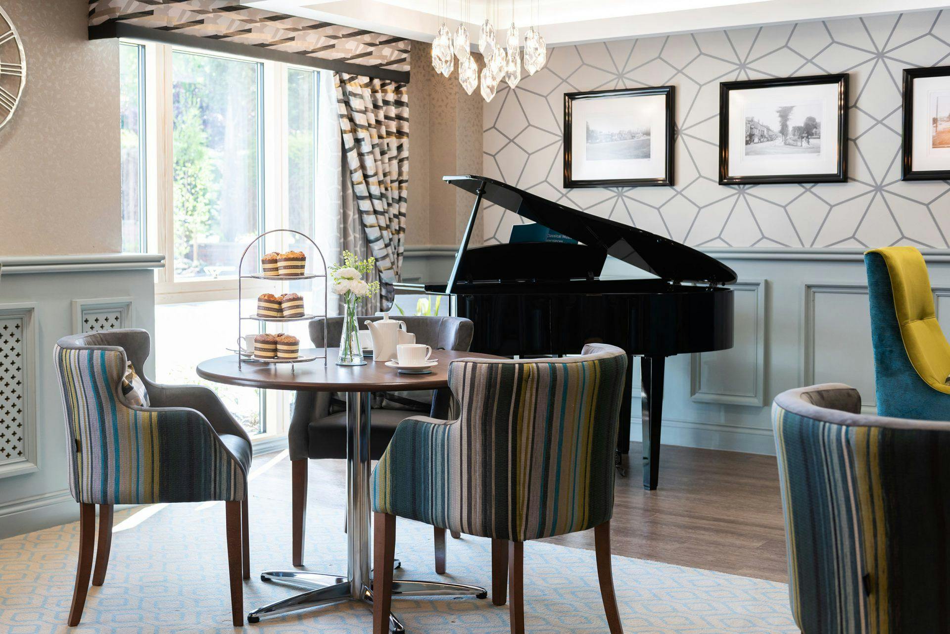 Piano room of Lakeview Grange care home in Chichester, West Sussex