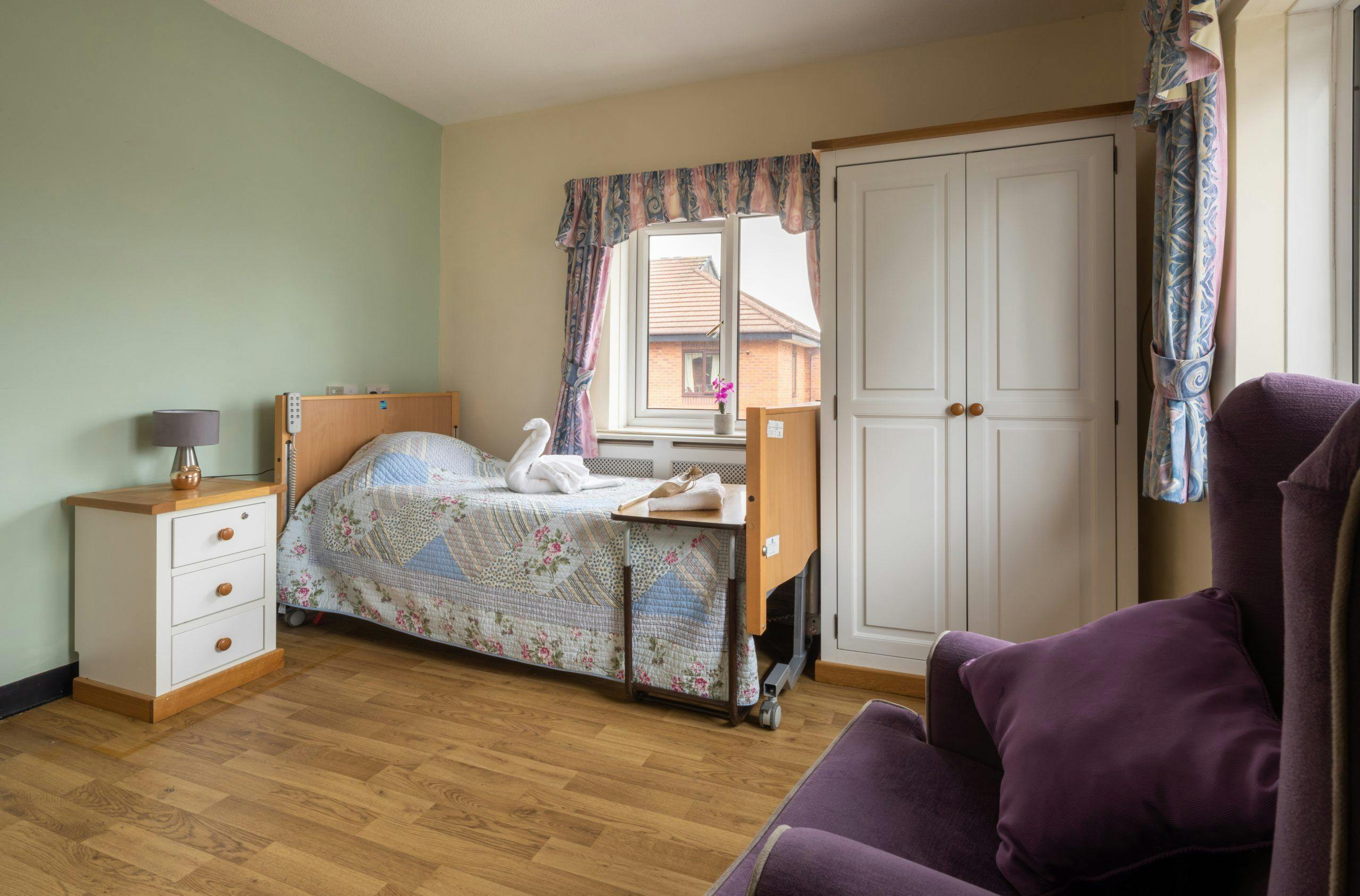 Bedroom of Rhiwlas care home in Flint, Wales