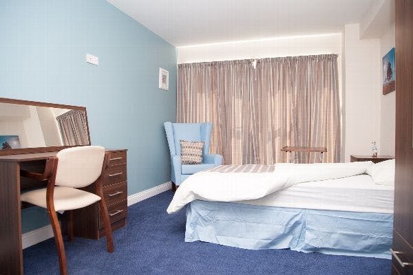 Bedroom at Madison Court Care Home in St Helens, Merseyside