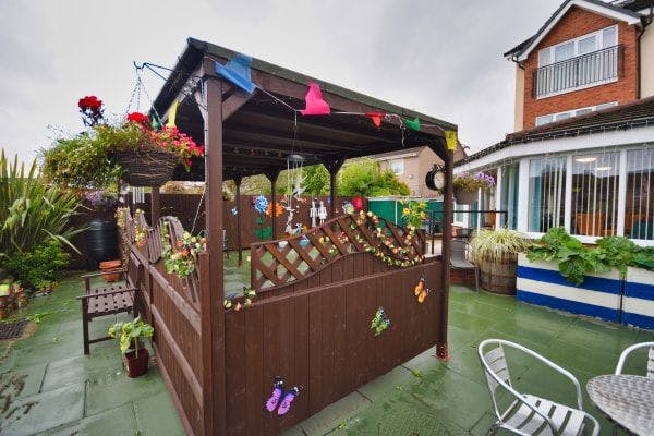 Garden and decking at Madison Court Care Home in St Helens