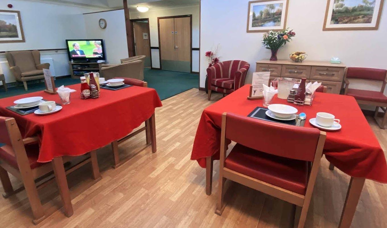Dining room of Maiden Castle House care home in Dorchester, Dorset