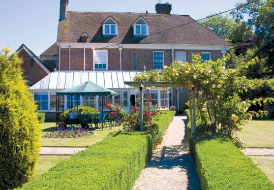 Garden and Conservatory at Nyton House Residential Care Home, Chichester, West Sussex