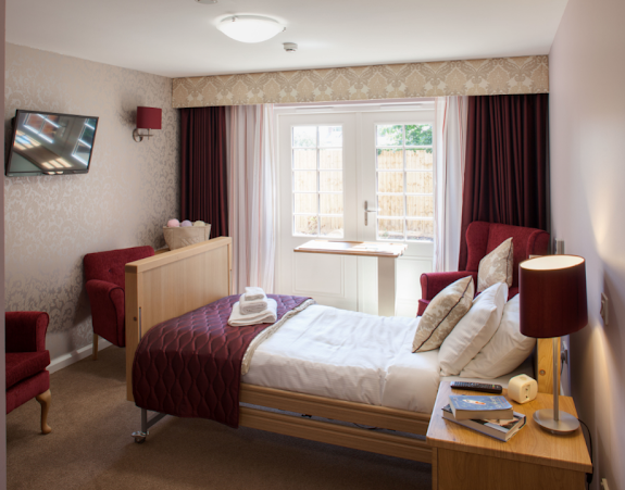 Bedroom of Heol Don care home in Cardiff, Wales