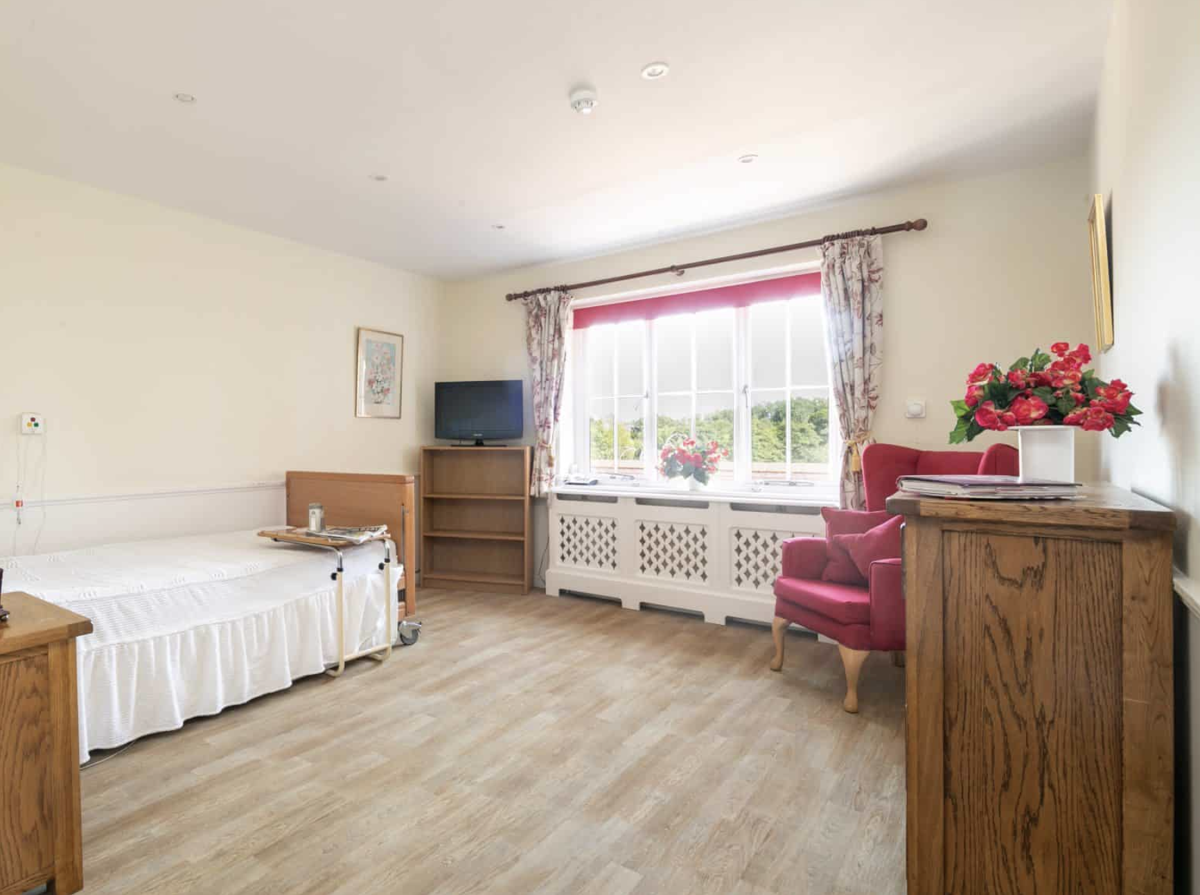 BEdroom of Birtley House care home in Guildford, Surrey