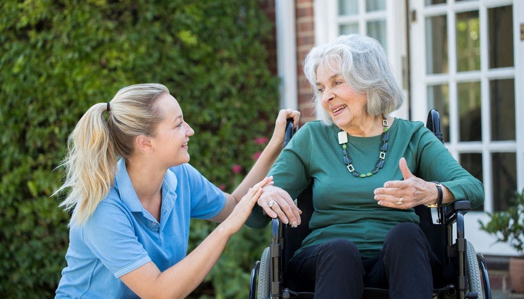 A care worker with a resident